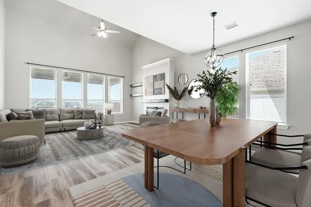 a living room with furniture and a table