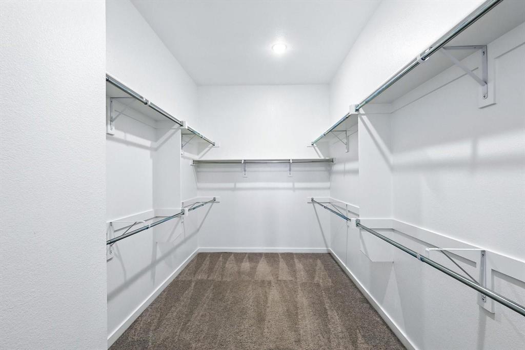 4203 Parrot Lane Sherman, TX 75092 - Photo 24 of 38 a view of a room with racks on the wall