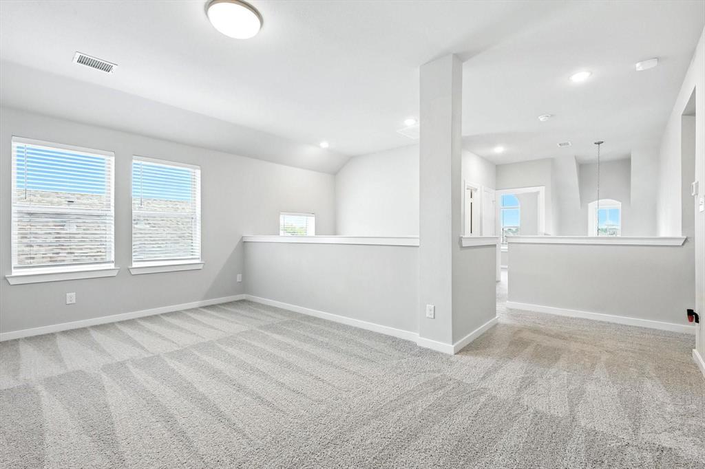 4203 Parrot Lane Sherman, TX 75092 - Photo 27 of 38 a view of an empty room with a window