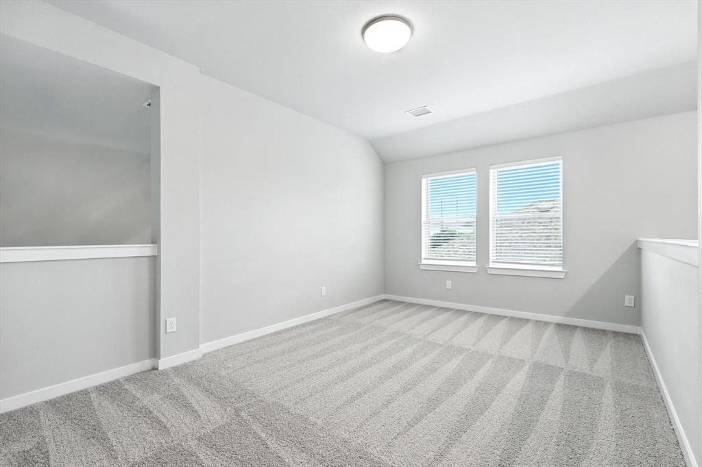 4203 Parrot Lane Sherman, TX 75092 - Photo 28 of 38 an empty room with windows