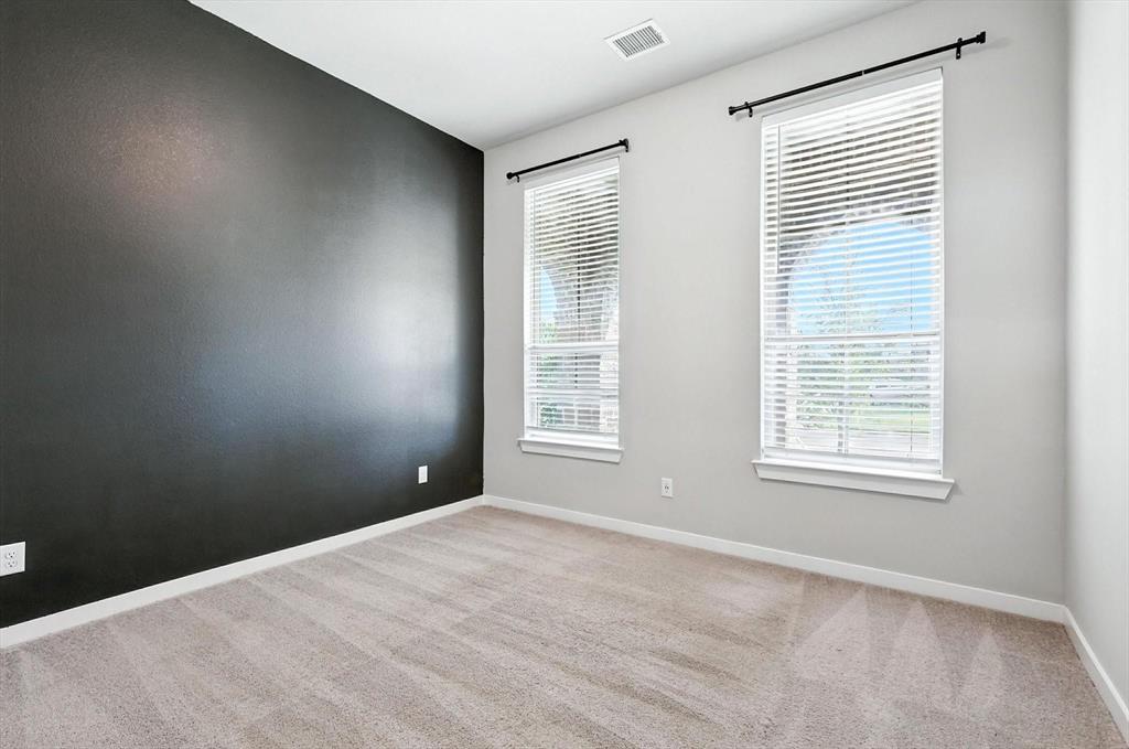 4203 Parrot Lane Sherman, TX 75092 - Photo 3 of 38 a view of an empty room with a window