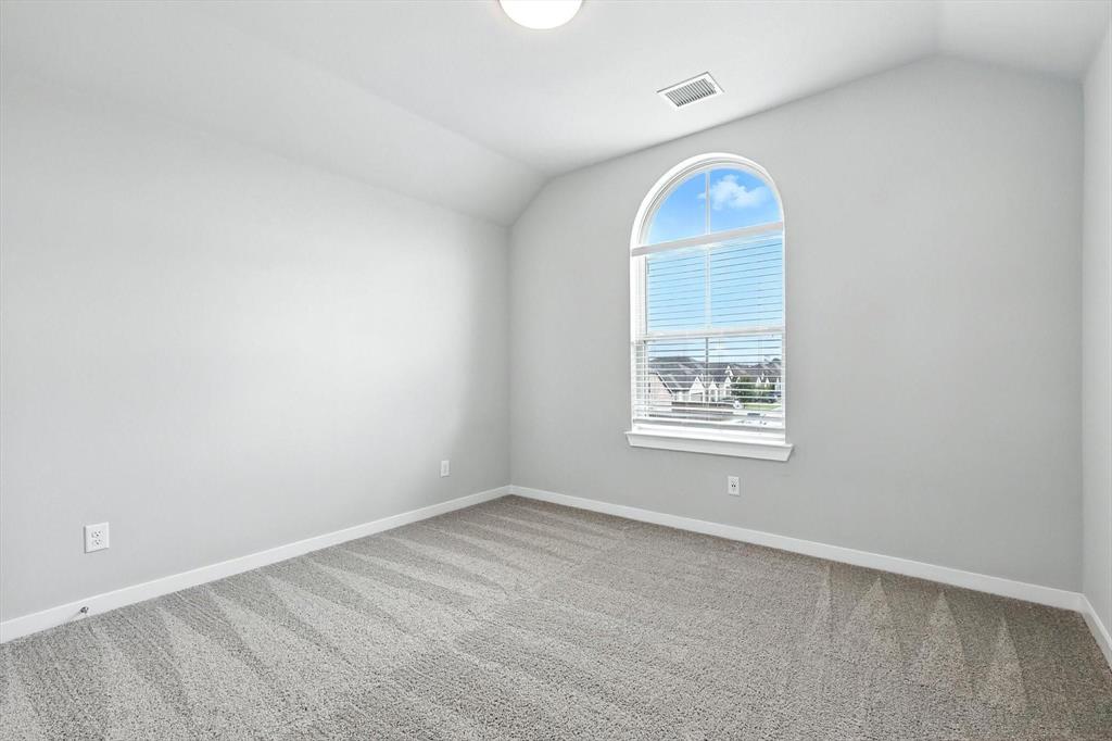 4203 Parrot Lane Sherman, TX 75092 - Photo 32 of 38 an empty room with a window
