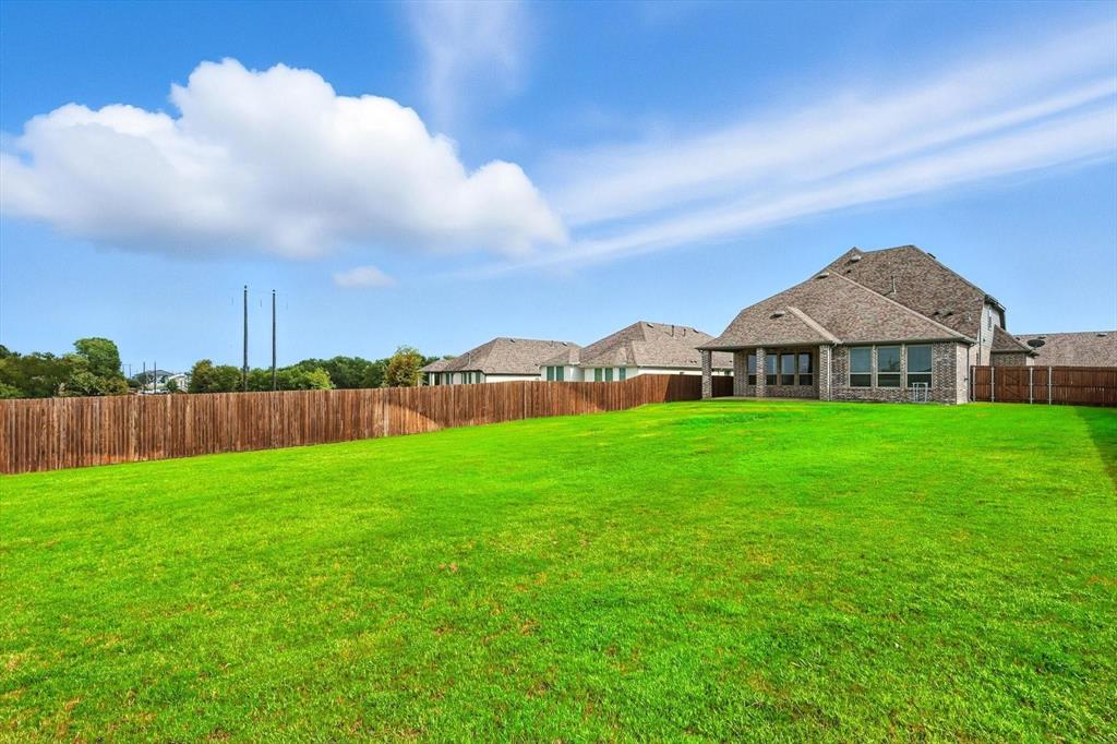 4203 Parrot Lane Sherman, TX 75092 - Photo 38 of 38 a view of a big house with a big yard and large trees