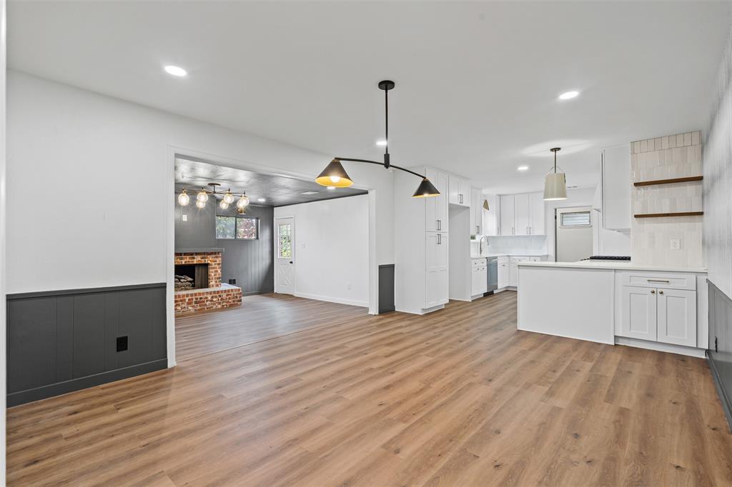 4920 Rector Avenue Fort Worth, TX 76133 - Photo 12 of 37 a view of a kitchen with wooden floor