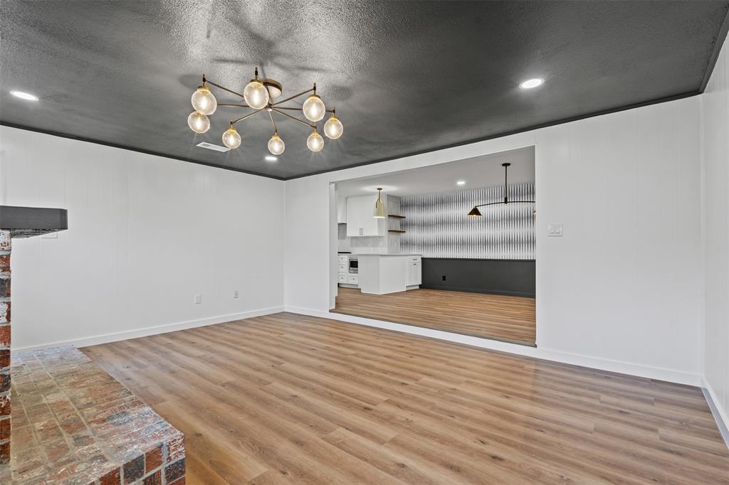 4920 Rector Avenue Fort Worth, TX 76133 - Photo 18 of 37 a view of empty room with wooden floor