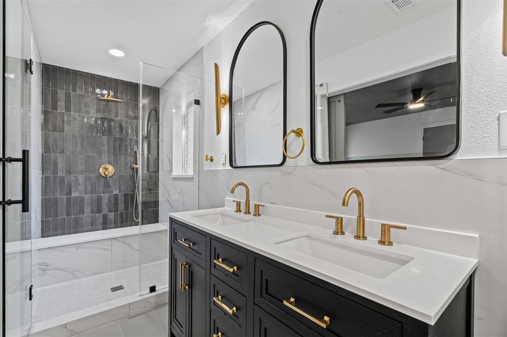 4920 Rector Avenue Fort Worth, TX 76133 - Photo 34 of 37 a bathroom with a double vanity sink mirror and bathtub