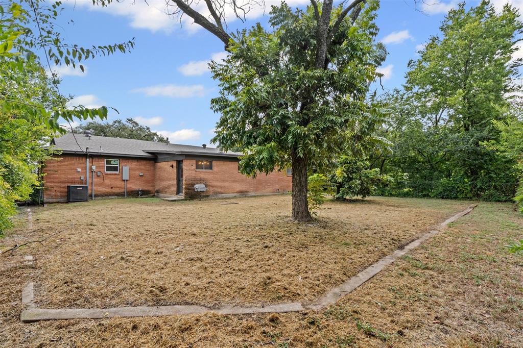 4920 Rector Avenue Fort Worth, TX 76133 - Photo 37 of 37 a front view of a house with a garden