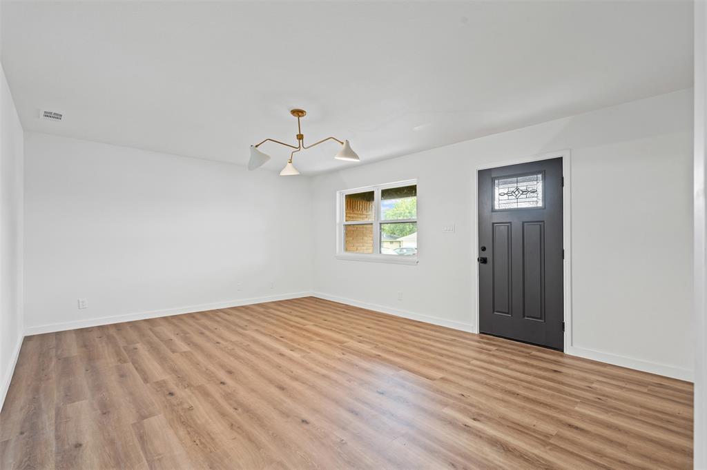 4920 Rector Avenue Fort Worth, TX 76133 - Photo 10 of 37 a view of empty room with wooden floor