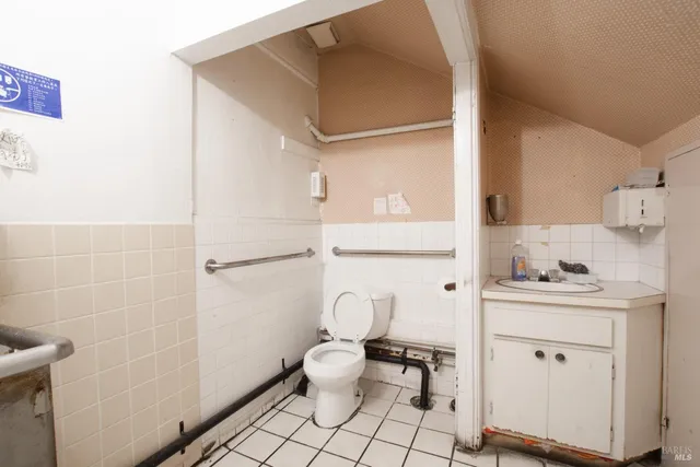 a view of staircase with white walls