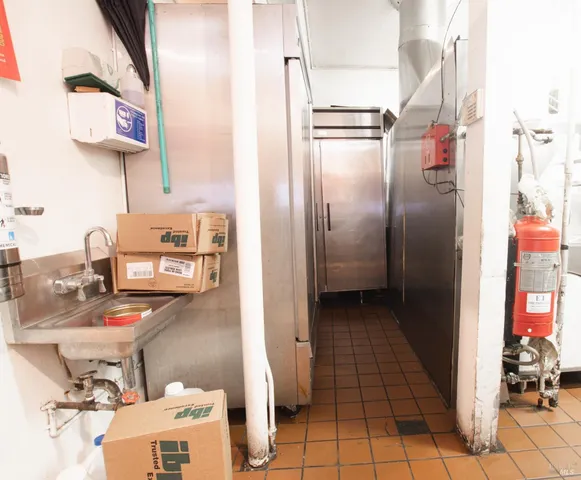 a room with furniture and a chandelier