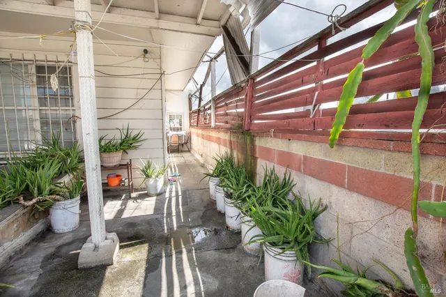 a backyard of a house with seating space