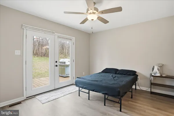 a living room with a table and a window