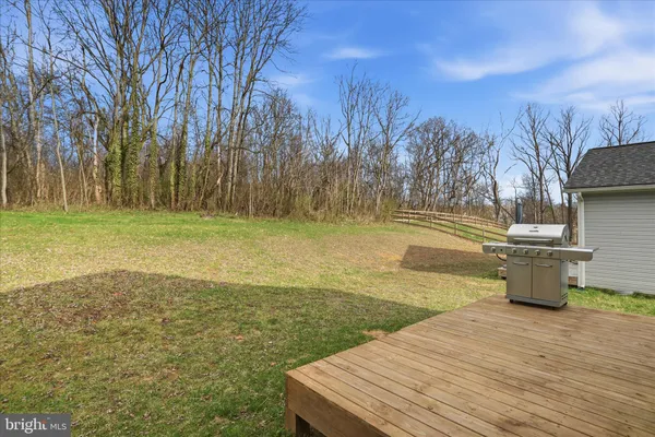 a view of a yard with an outdoor space