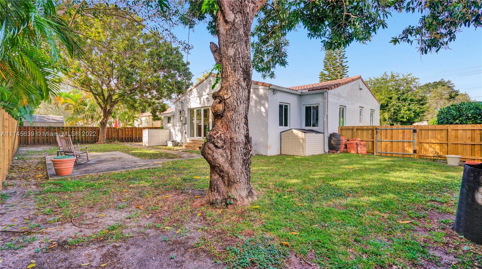152 Northwest 103rd Street Miami Shores, FL 33150 - Photo 5 of 27 a view of a house with backyard and a tree