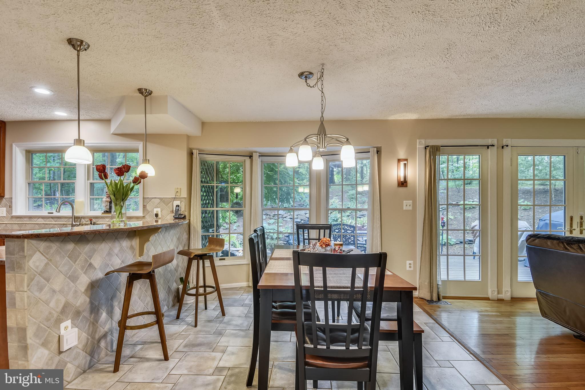 1515 Stuart Road Reston, VA 20194 - Photo 20 of 81 Kitchen/Dining, Breakfast Bar, Travertine Flooring