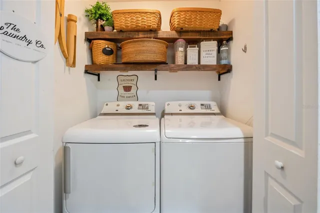 a utility room with dryer and washer