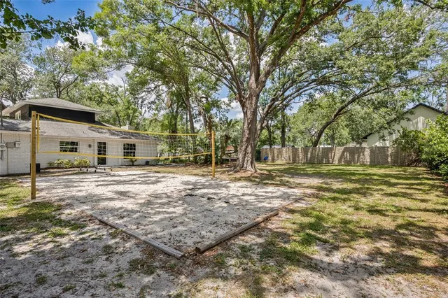 a backyard of a house with lots of green space
