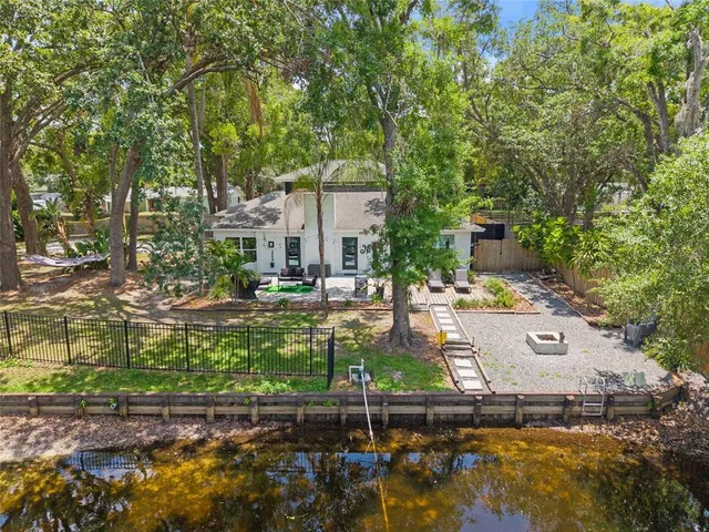 a view of a house with a lake view