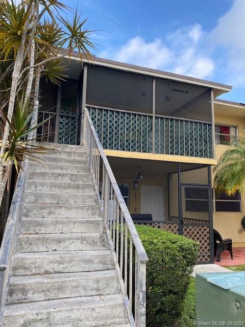 15619 Southwest 73rd Cir Terrace, Unit 106 Miami, FL 33193 - Photo 3 of 18 a view of entryway with a front door