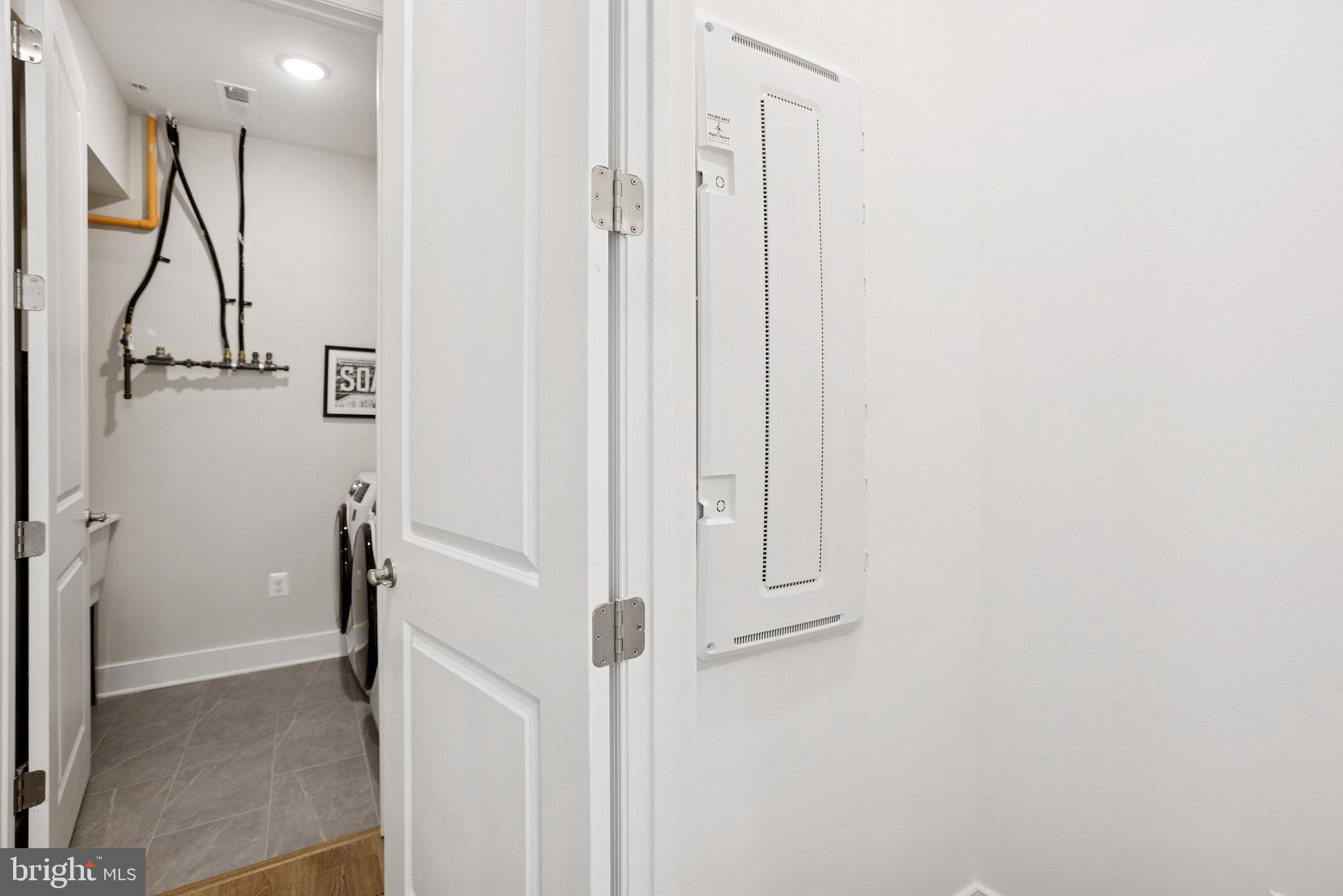 0 Grandiflora Circle Perry Hall, MD 21128 - Photo 19 of 30 a view of a hallway with wooden floor and entryway