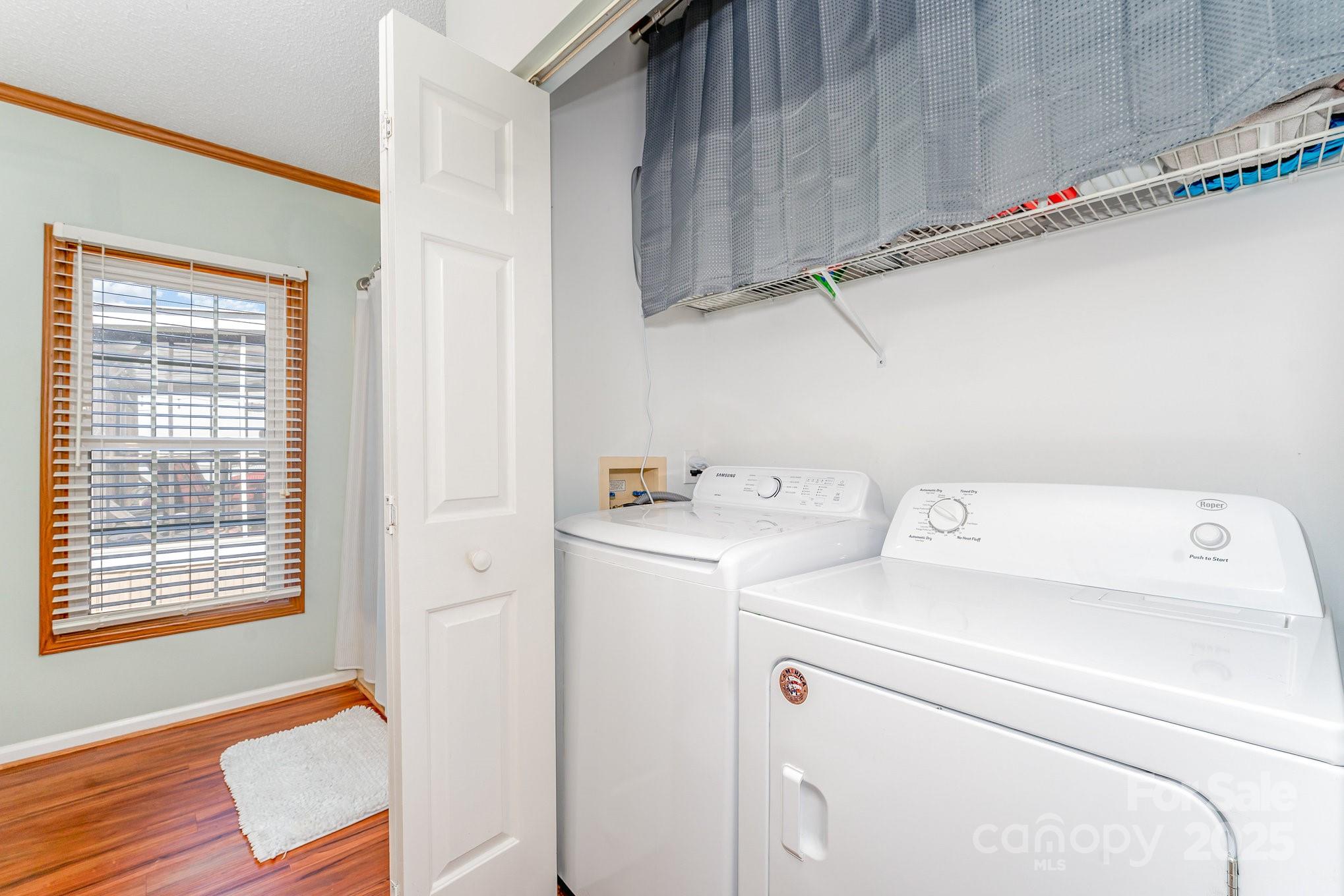 231 Badin Vw Road New London, NC 28127 - Photo 11 of 48 a utility room with dryer and washer