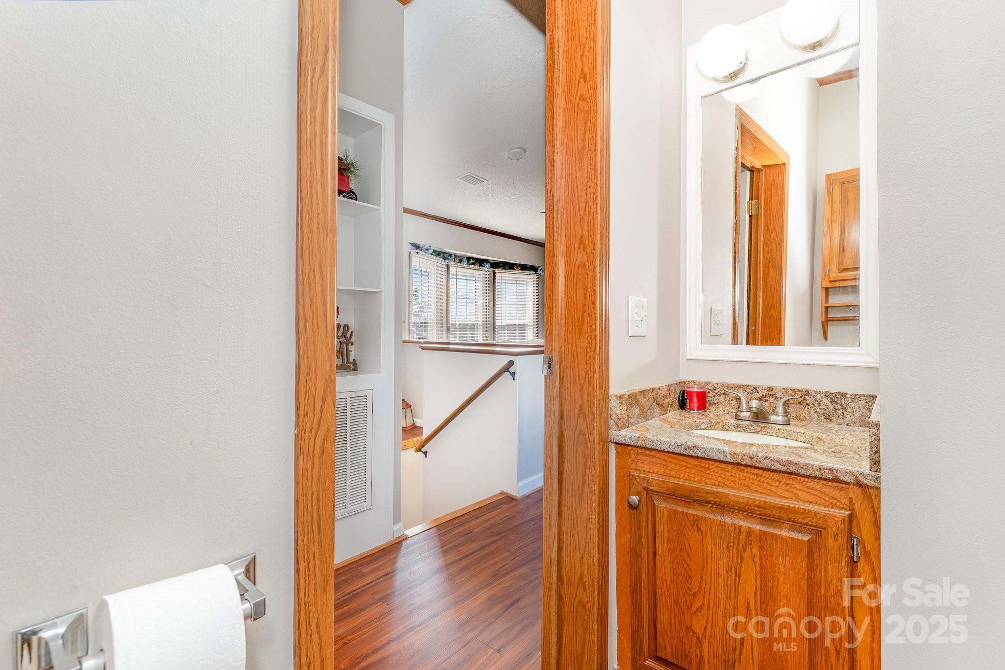 231 Badin Vw Road New London, NC 28127 - Photo 14 of 48 a bathroom with a sink and a mirror