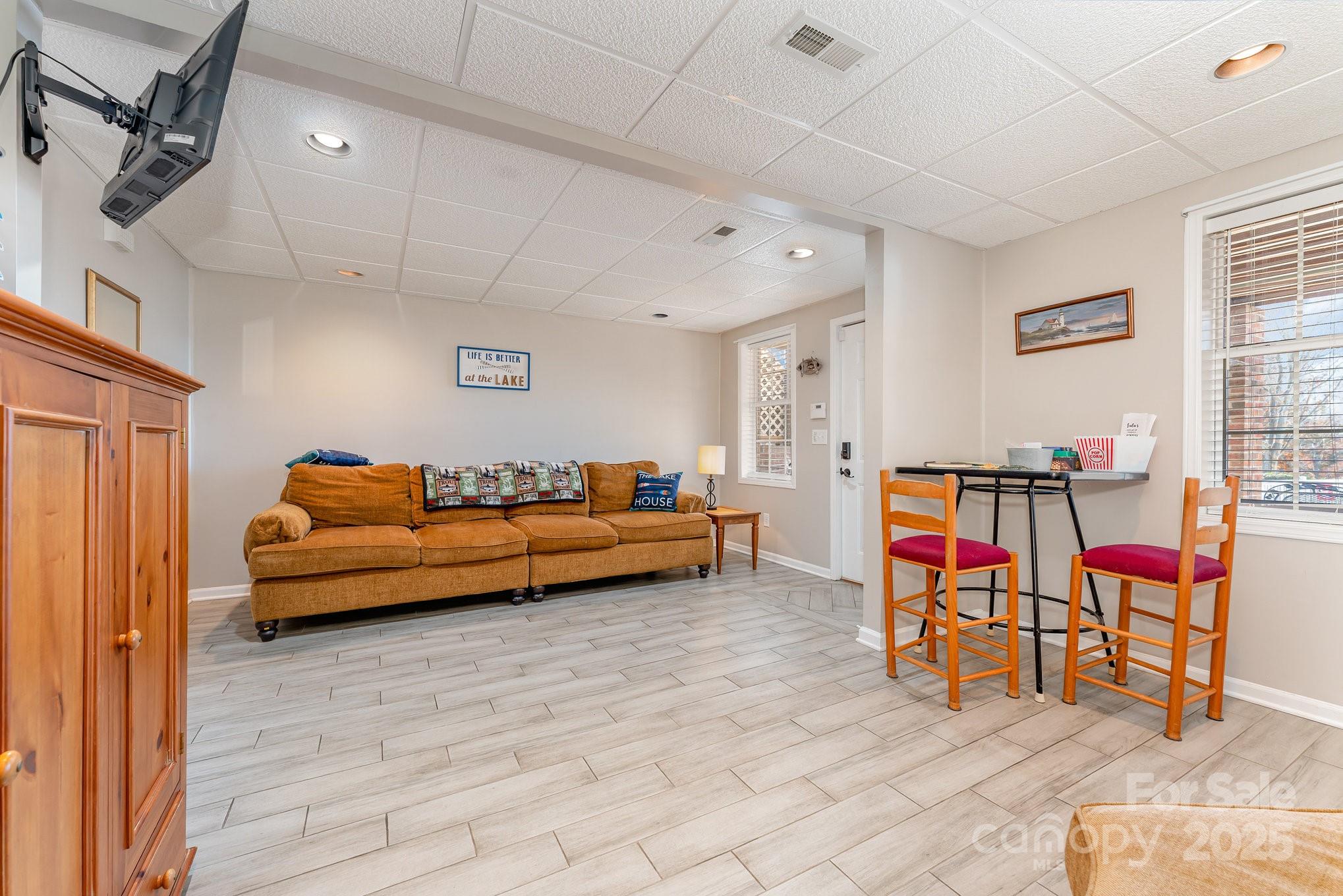 231 Badin Vw Road New London, NC 28127 - Photo 17 of 48 a bedroom with furniture and a rug