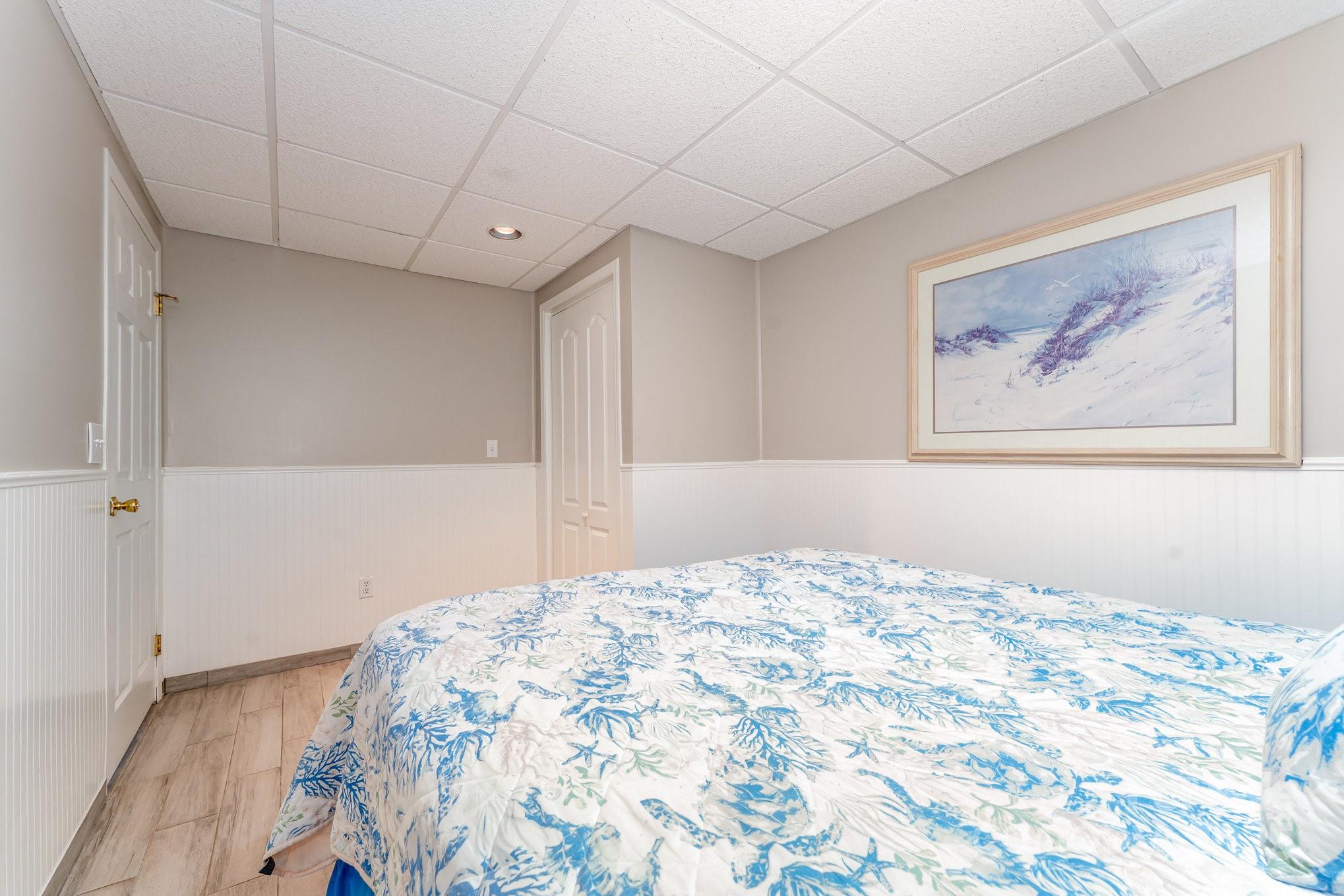 231 Badin Vw Road New London, NC 28127 - Photo 19 of 48 a bedroom with a bed and a painting on the wall