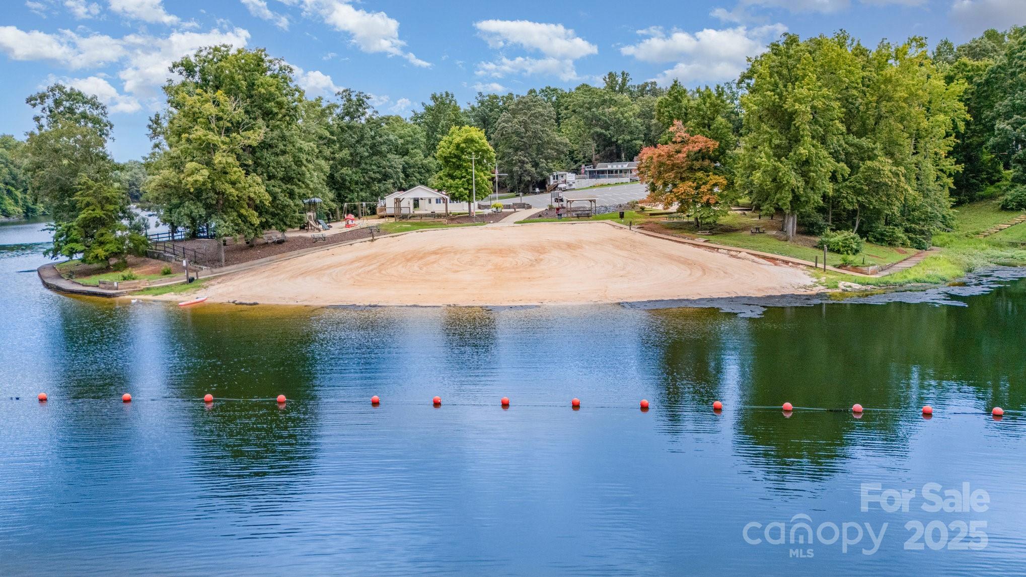 231 Badin Vw Road New London, NC 28127 - Photo 36 of 48 a backyard of a house with lots of green space