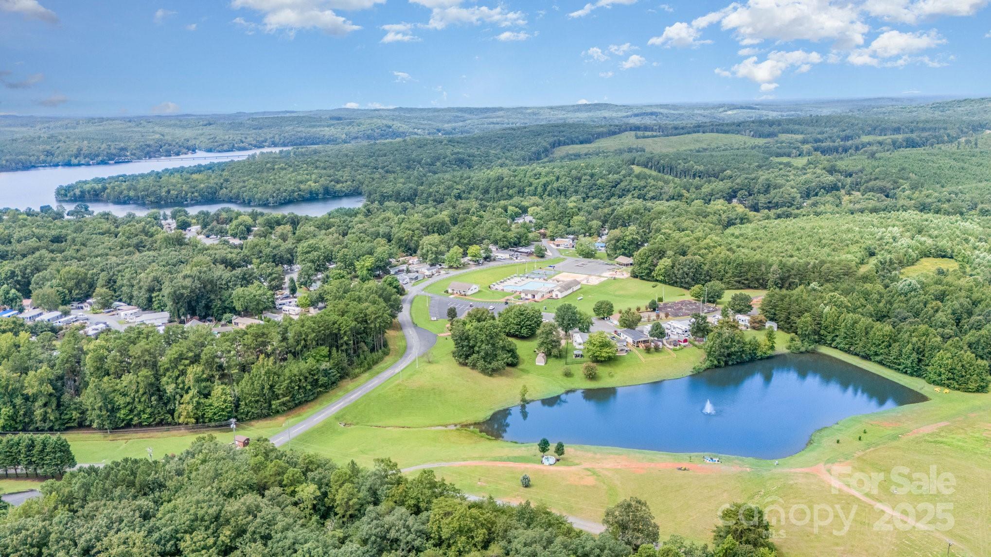 231 Badin Vw Road New London, NC 28127 - Photo 39 of 48 an aerial view of a house with a yard