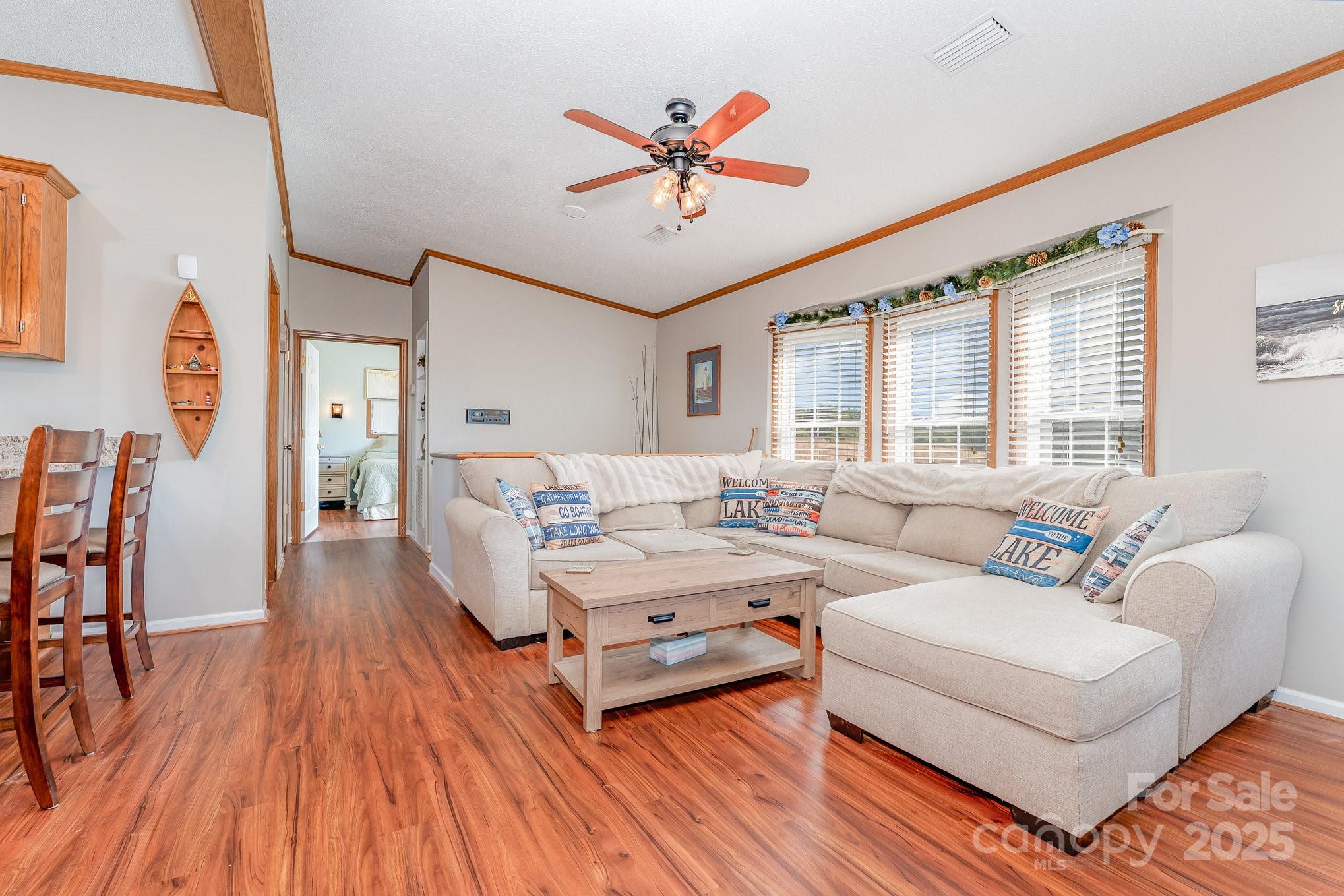 231 Badin Vw Road New London, NC 28127 - Photo 4 of 48 a living room with furniture and a large window