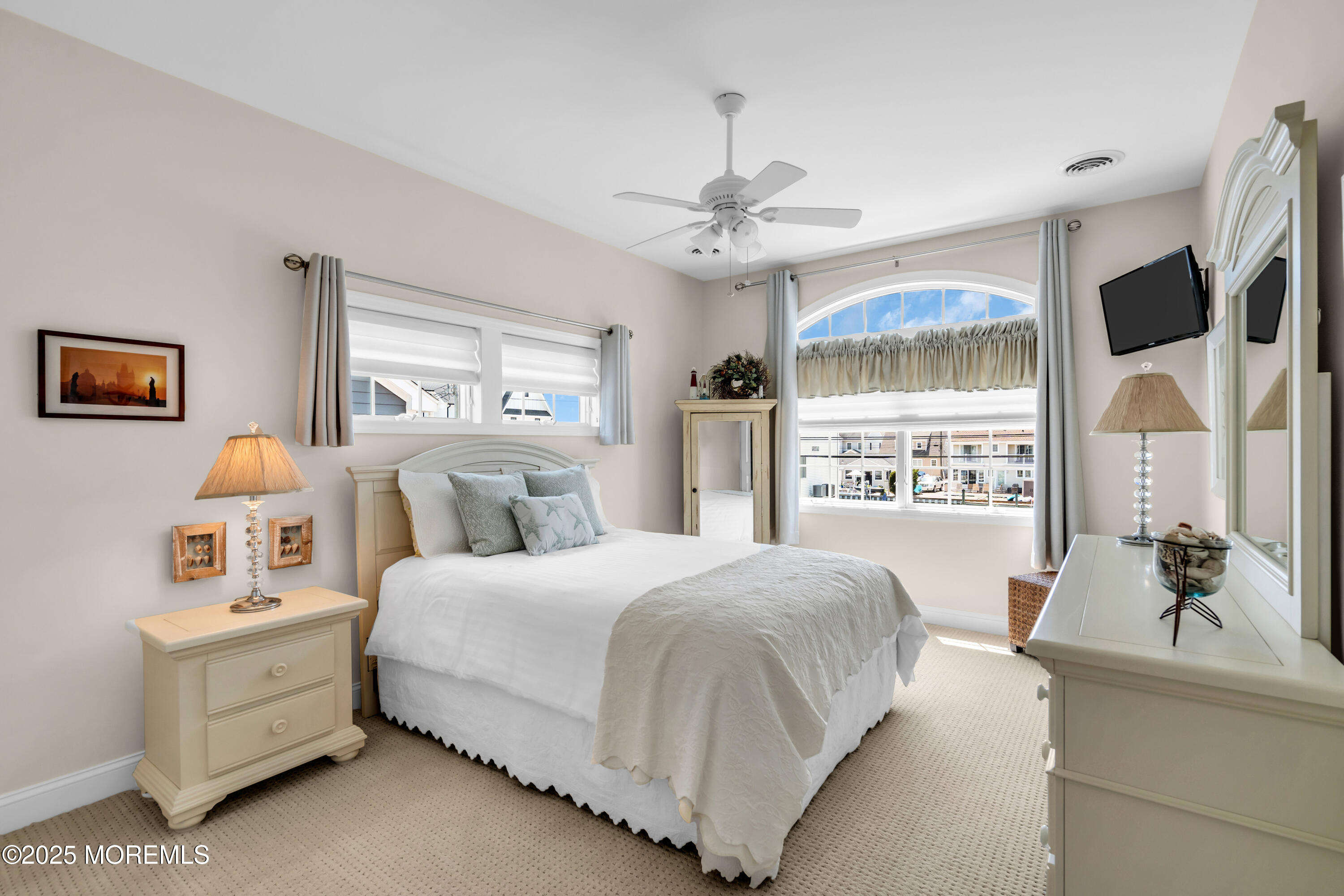 230 South Lagoon Road Lavallette, NJ 08735 - Photo 12 of 24 a bedroom with a bed dresser and window