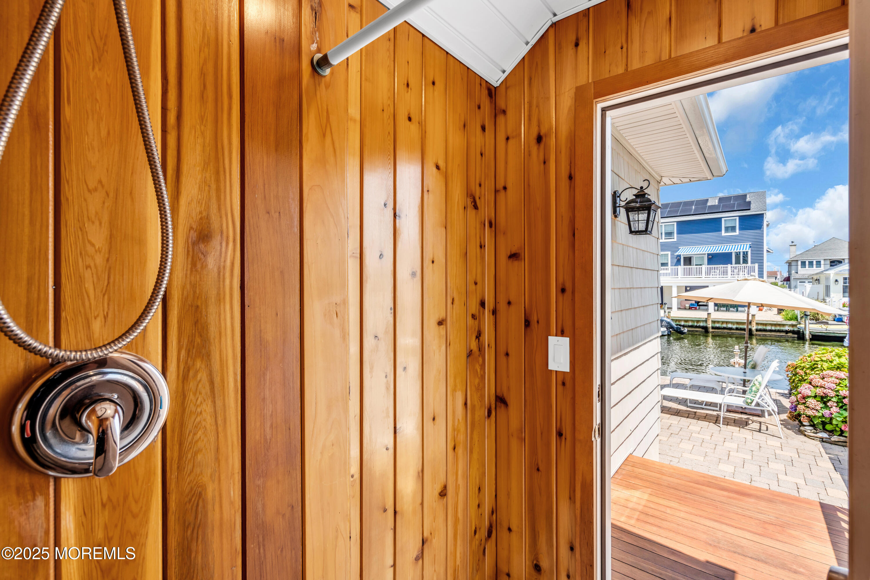 230 South Lagoon Road Lavallette, NJ 08735 - Photo 19 of 24 a view of a balcony with washer and dryer