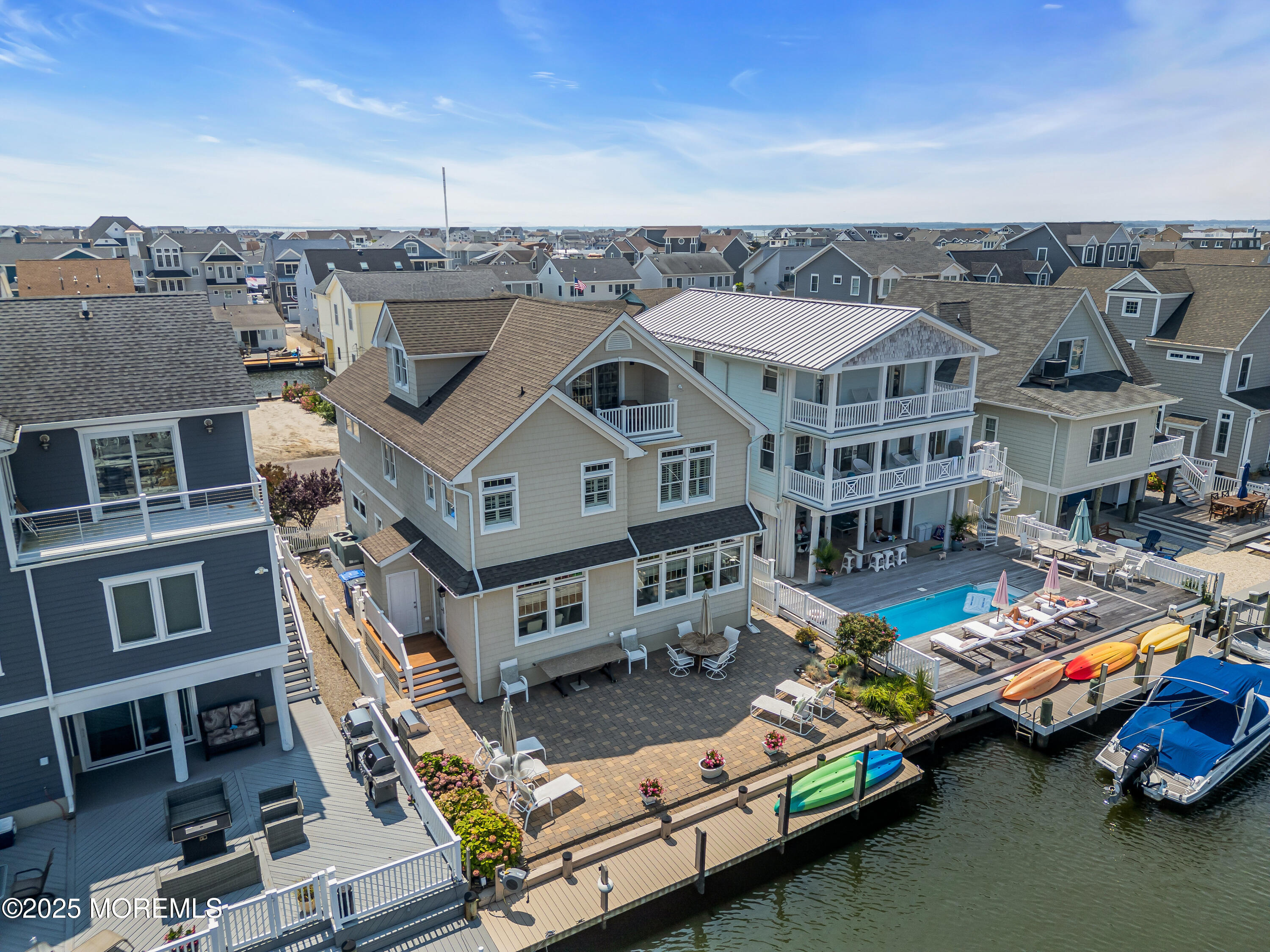 230 South Lagoon Road Lavallette, NJ 08735 - Photo 2 of 24 a view of a city that has lawn chairs
