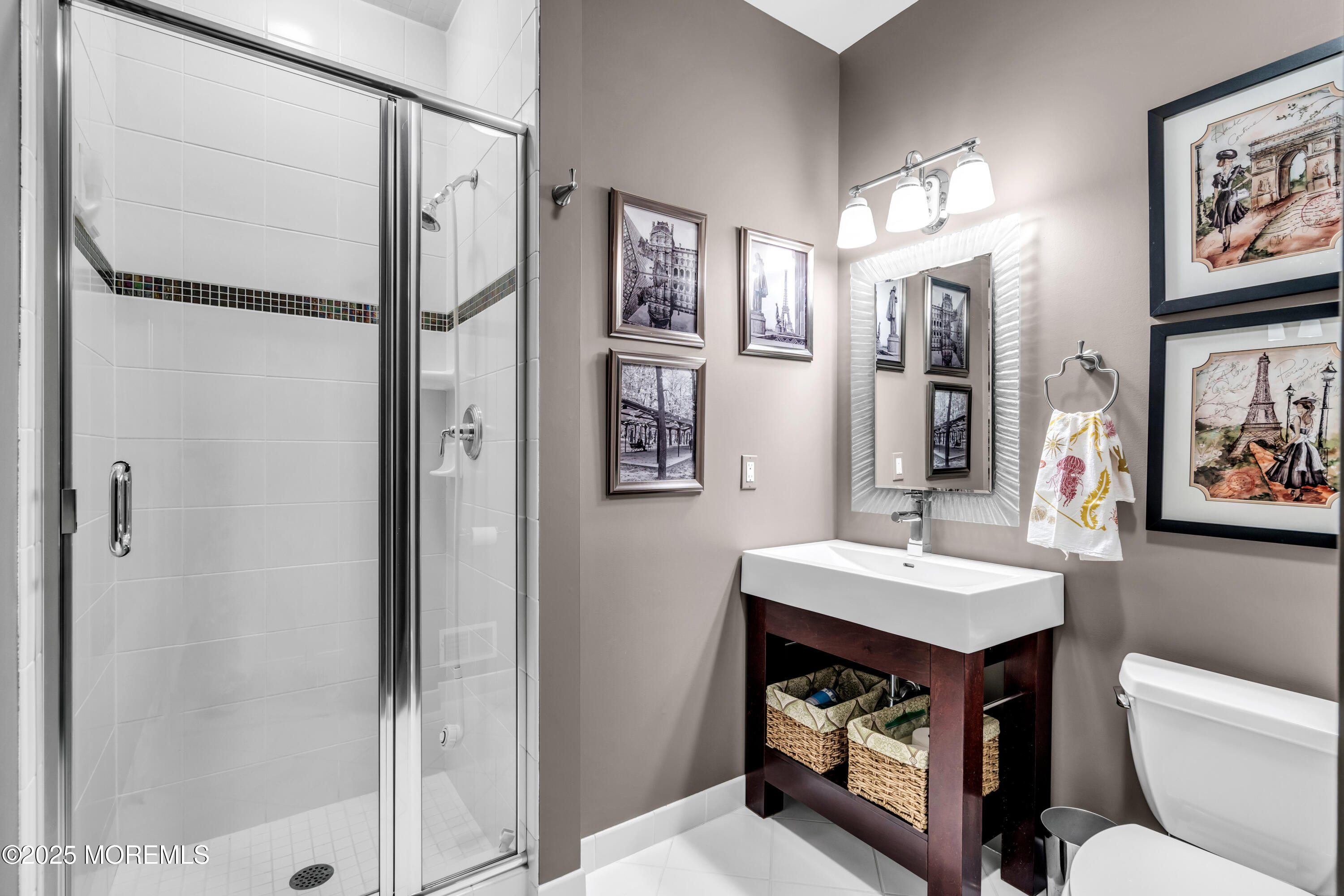 230 South Lagoon Road Lavallette, NJ 08735 - Photo 6 of 24 a bathroom with a sink toilet and shower