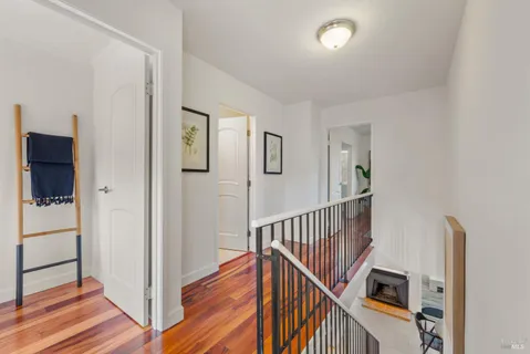 a bedroom with furniture and window