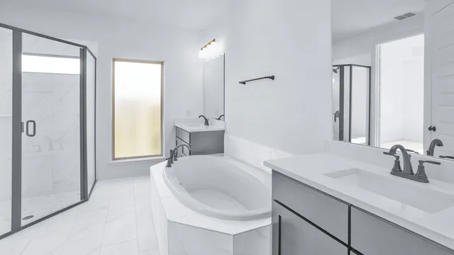 a en suite bathroom with a sink and a mirror