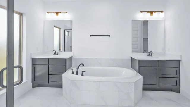 a white bath tub sitting in a bathroom