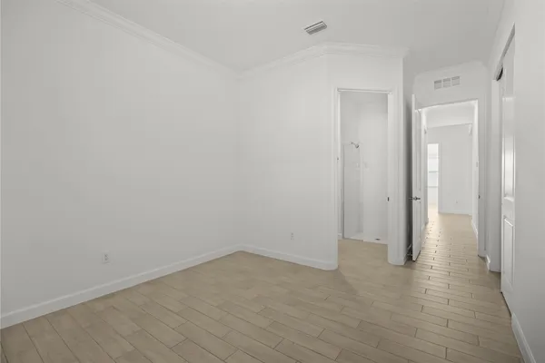 a bathroom with a toilet sink and a shower