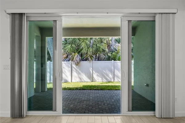 a view of backyard with green space