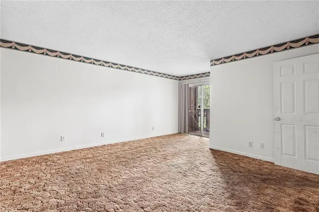 a view of a room with rack on the wall