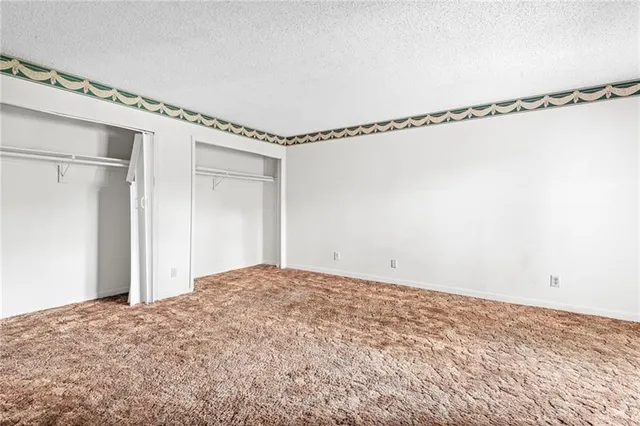 a view of a room with an empty space