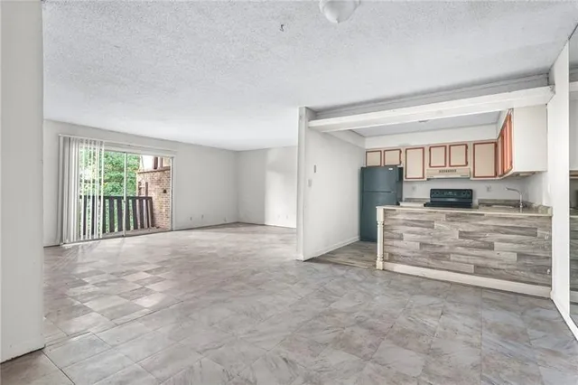 a view of empty room with a window