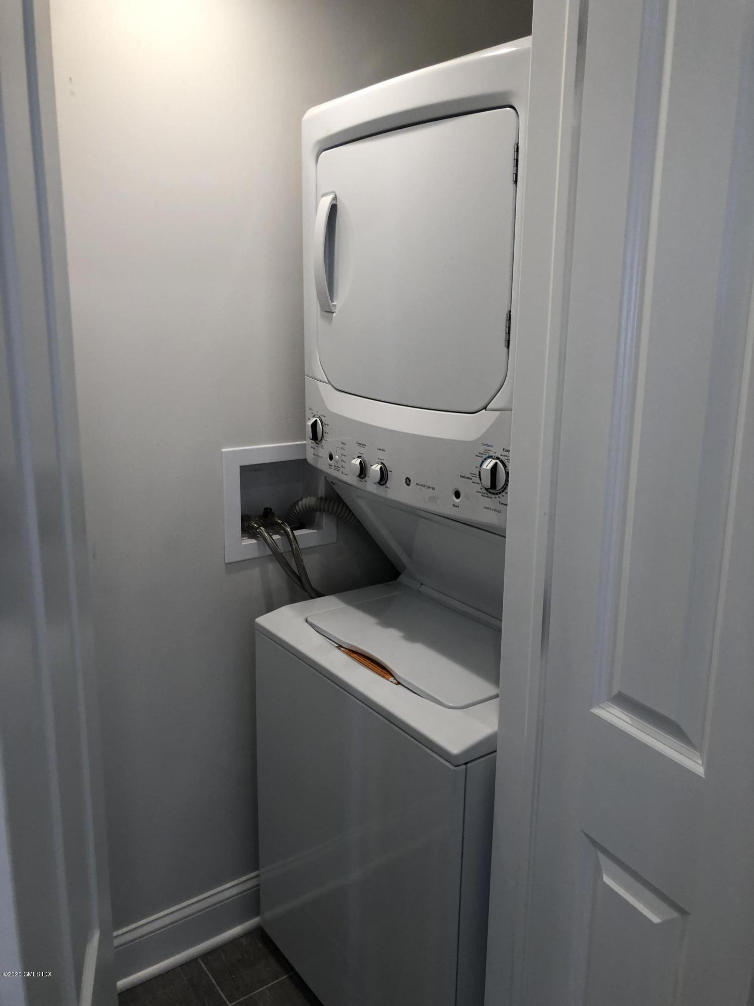 30 Harold Avenue, Unit 2 Greenwich, CT 06830 - Photo 4 of 11 a utility room with dryer and washer