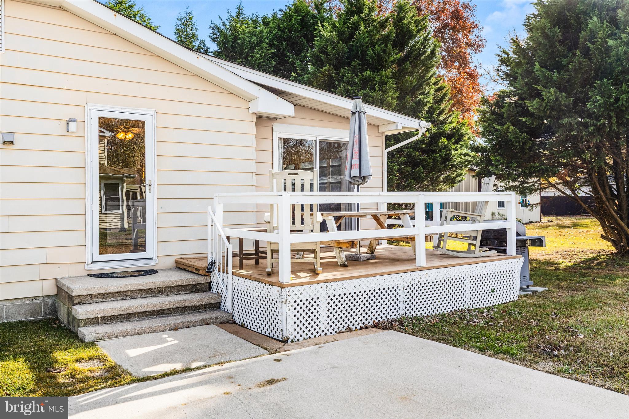 36466 Old Mill Road Ocean View, DE 19970 - Photo 31 of 36 Convenient deck off kitchen and sunroom
