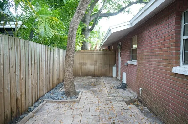 a view of a pathway with a house