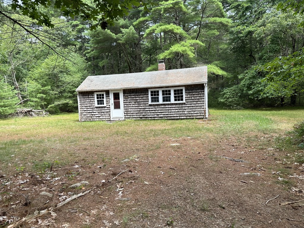 5 Fire Island Road Wareham, MA 02571 - Photo 2 of 7 a view of a house with yard and sitting area