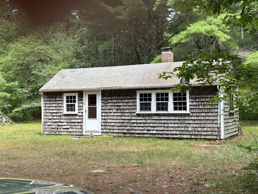 5 Fire Island Road Wareham, MA 02571 - Photo 5 of 7 a view of a house with a yard