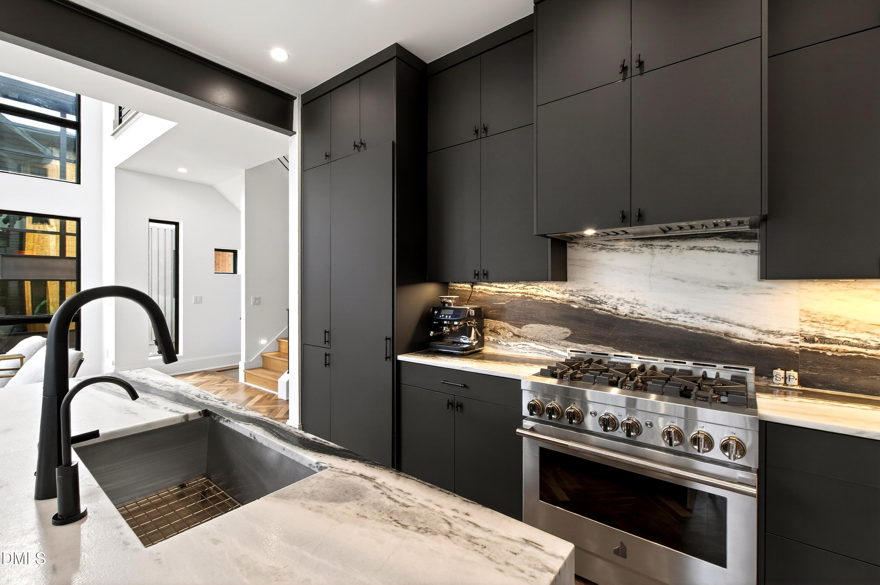 1617 Nottingham Road Raleigh, NC 27607 - Photo 23 of 76 a kitchen with a stove and a sink