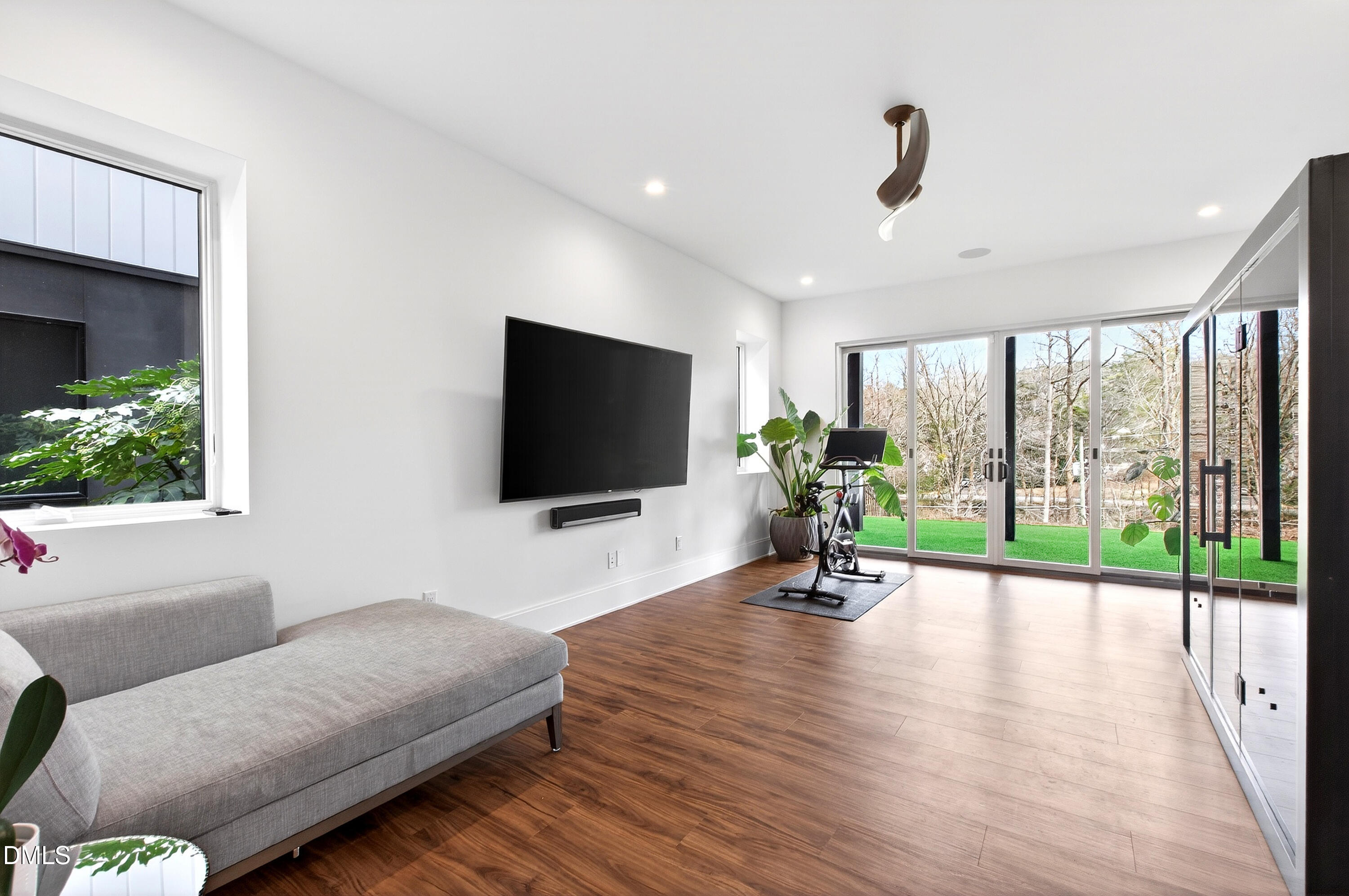 1617 Nottingham Road Raleigh, NC 27607 - Photo 53 of 76 a living room with furniture and a flat screen tv